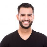 east asian handsome man wearing black tshirt and jeans